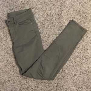 Divided army green jeans. Size 4.